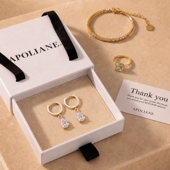 Pear Moissanite Huggies